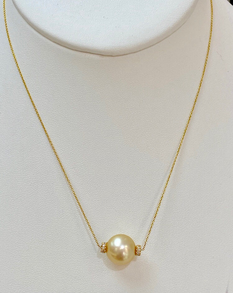 Natural Golden South Sea Pearl set with 2 diamond rondells on 14k chain